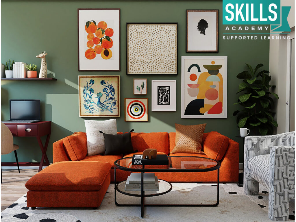 A beautifully designed interior with an orange couch and paintings on the wall. Study our Interior Design Courses today