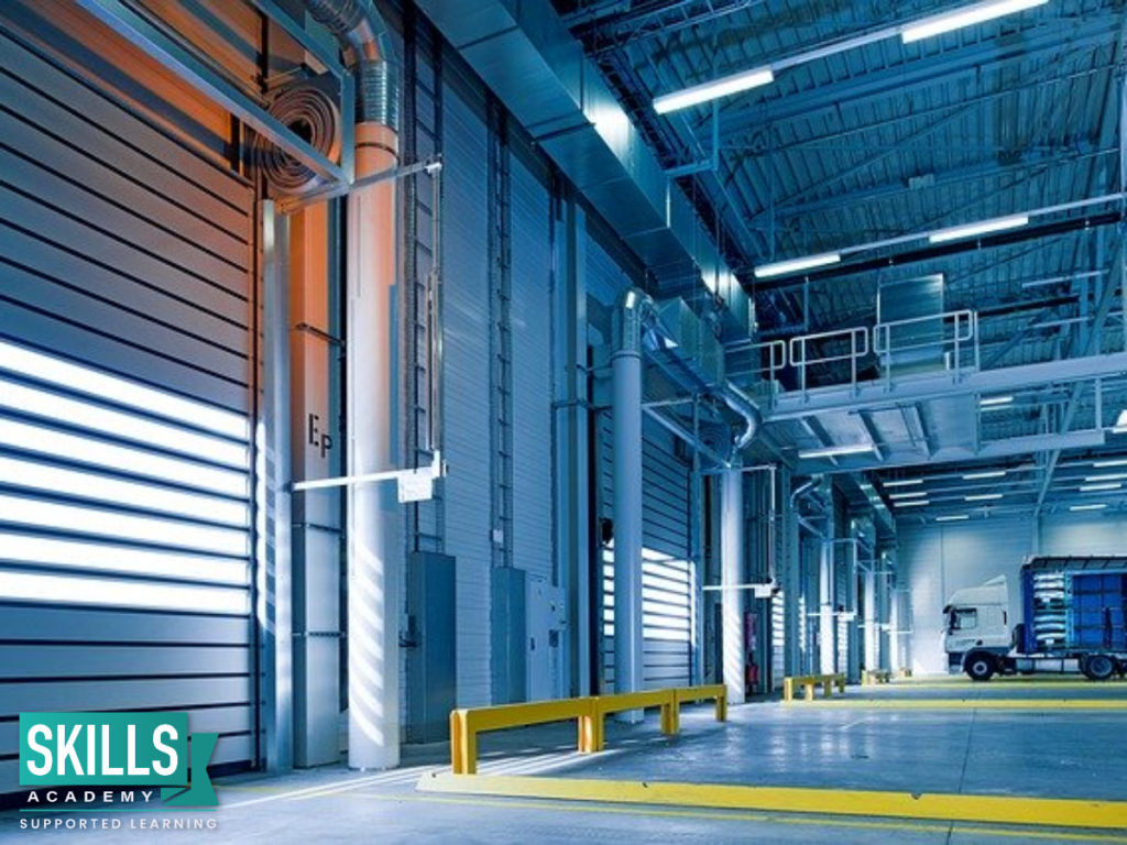 Inside a warehouse. Learn how to manager the inner workings of warehouse and more with Production and Operations Management Courses.