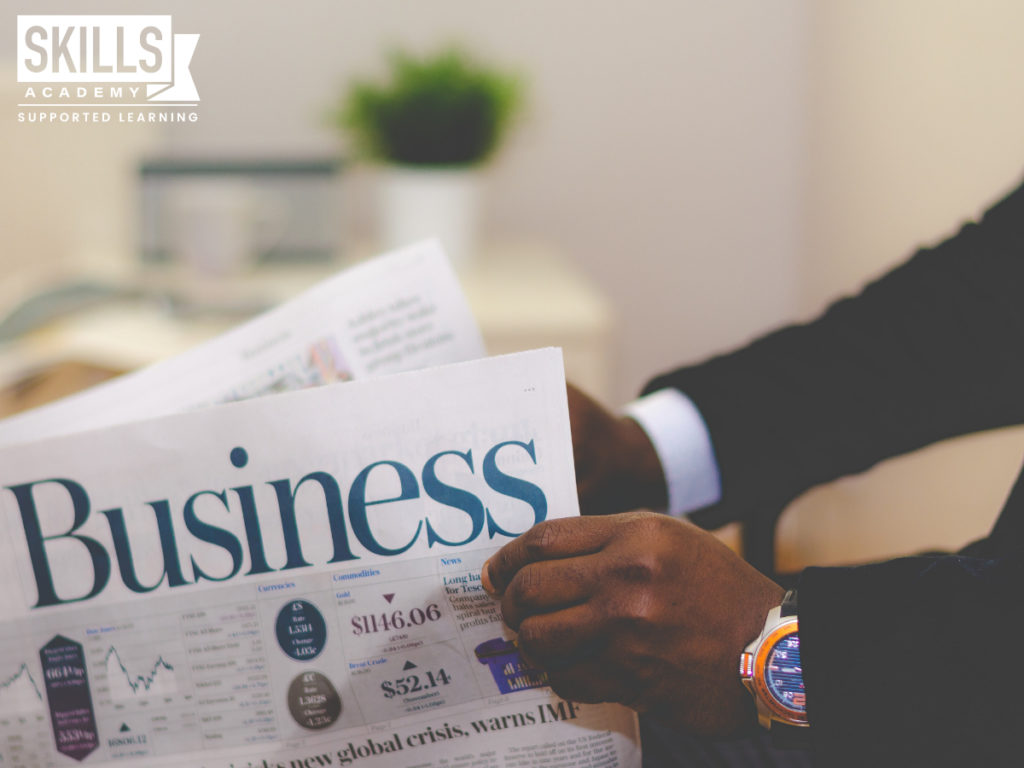 Person reading a business newspaper. Gain top skills from our Accounting Bookkeeping and Finance Courses