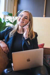 A professional on the phone making business decisions. Get Planning for Post-Covid Career tips right here.