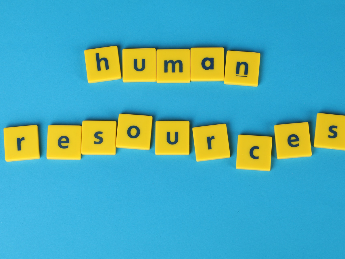 Human Resources spelled out on yellow blocks. Learn how the benefits of an HR Management Course will hep you start a successful career.