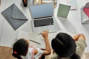 A mother and daughter exploring Homeschooling vs Online Learning