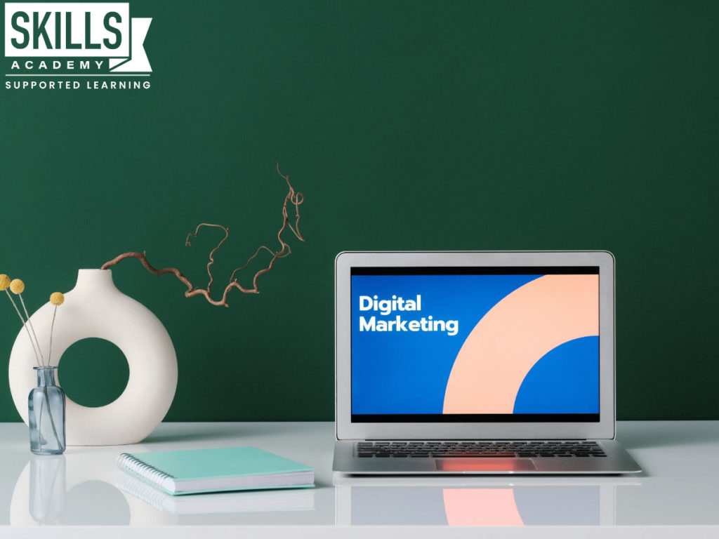 Laptop on the surface of a work desk. What is Digital Marketing? find out here