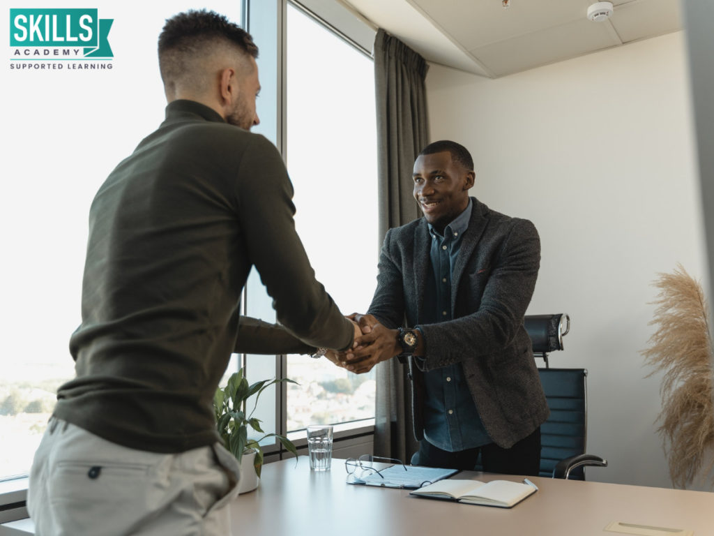 Recruiter shaking hands with an interviewee after an interview. Does your qualification guarantee a job? Find out more right here.
