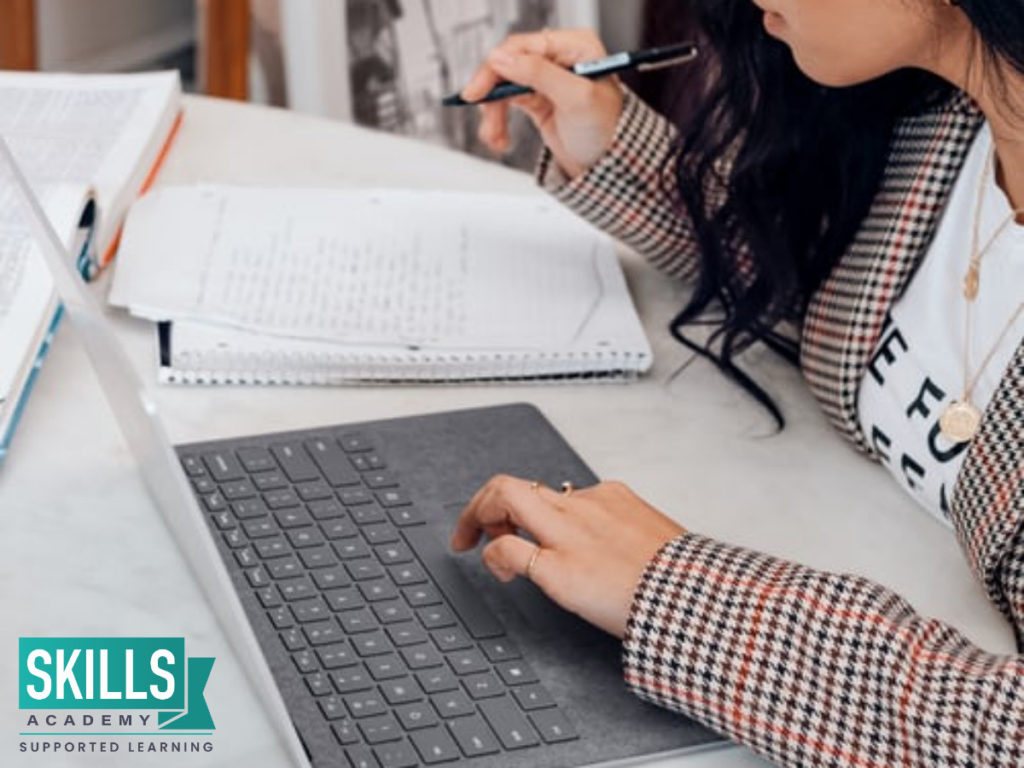 A young girl researching for what to do when you are unemployed