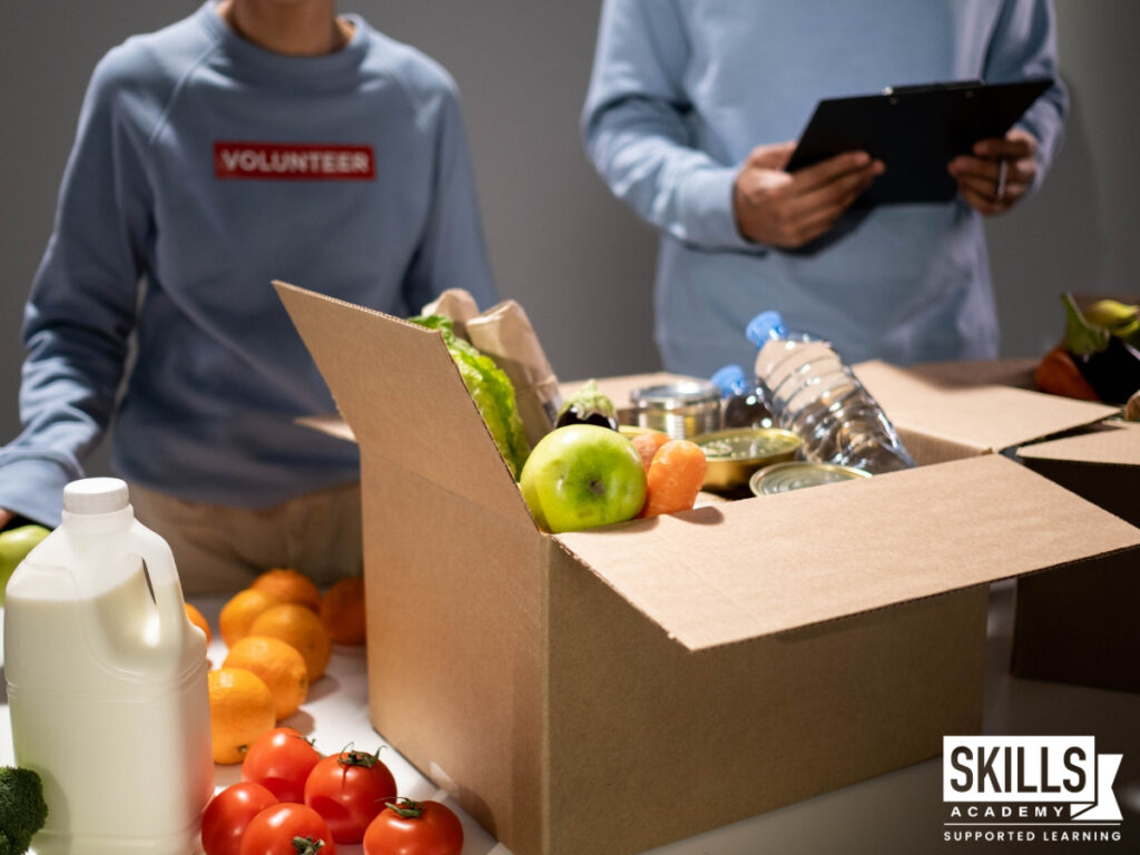 Volunteers packing food parcel boxes. Learn how to stay productive this festive season.
