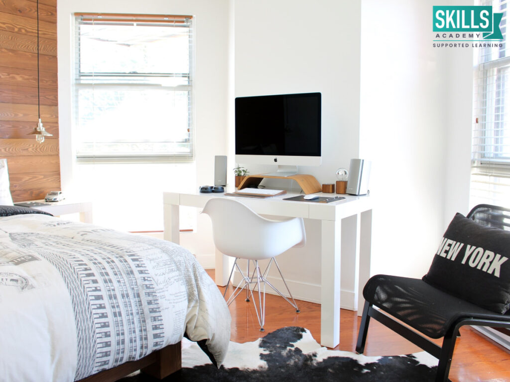 Workspace set up in a bedroom. Use our tips to set up your home office.