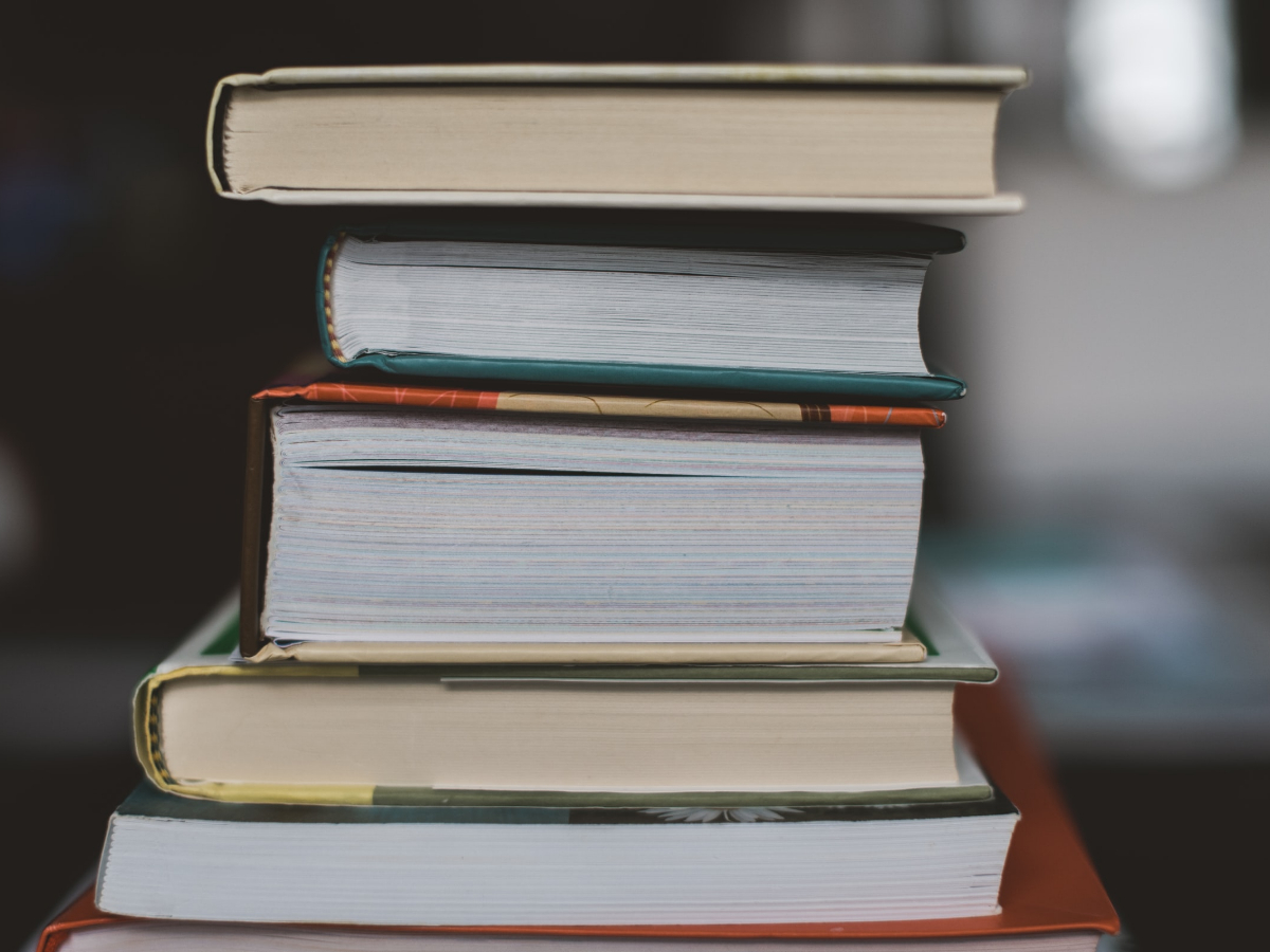 A stack of textbooks. Take a look at the matric subjects we offer right here.