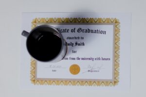 A certificate of graduation with a cup of coffee on it. Find out more about Umalusi and your matric certificate: what you know and come study with us today.
