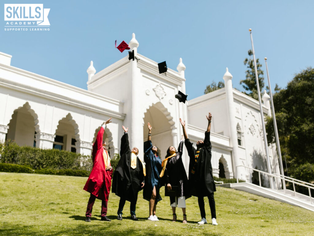 Group of friends throwing their graduation hat in the air. Steps to becoming a psychologist in south africa