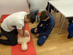 Person Learning resuscitation. Benefits of Studying a First Aid Course