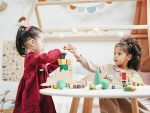 Two children playing with blocks. Childcare Courses you can Study Online