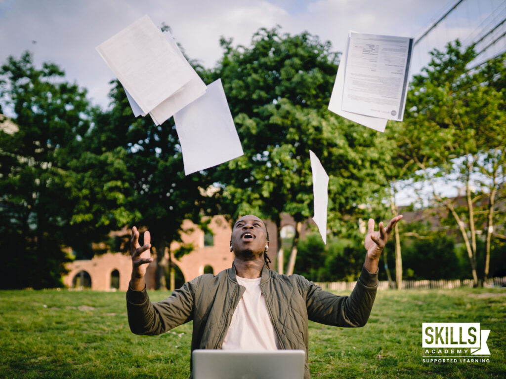 Guy throwing notes up into the air. How to fix Your CV