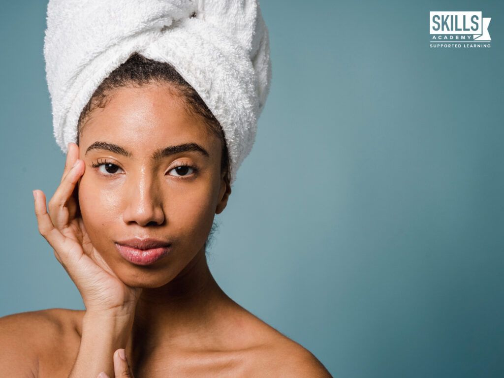 Girl with a towel on her head. How to Start a Career in Beauty Therapy.