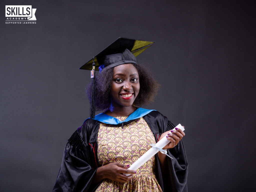 Girl standing in front of a wall with her degree in her hand. Which Qualification Should you Pursue