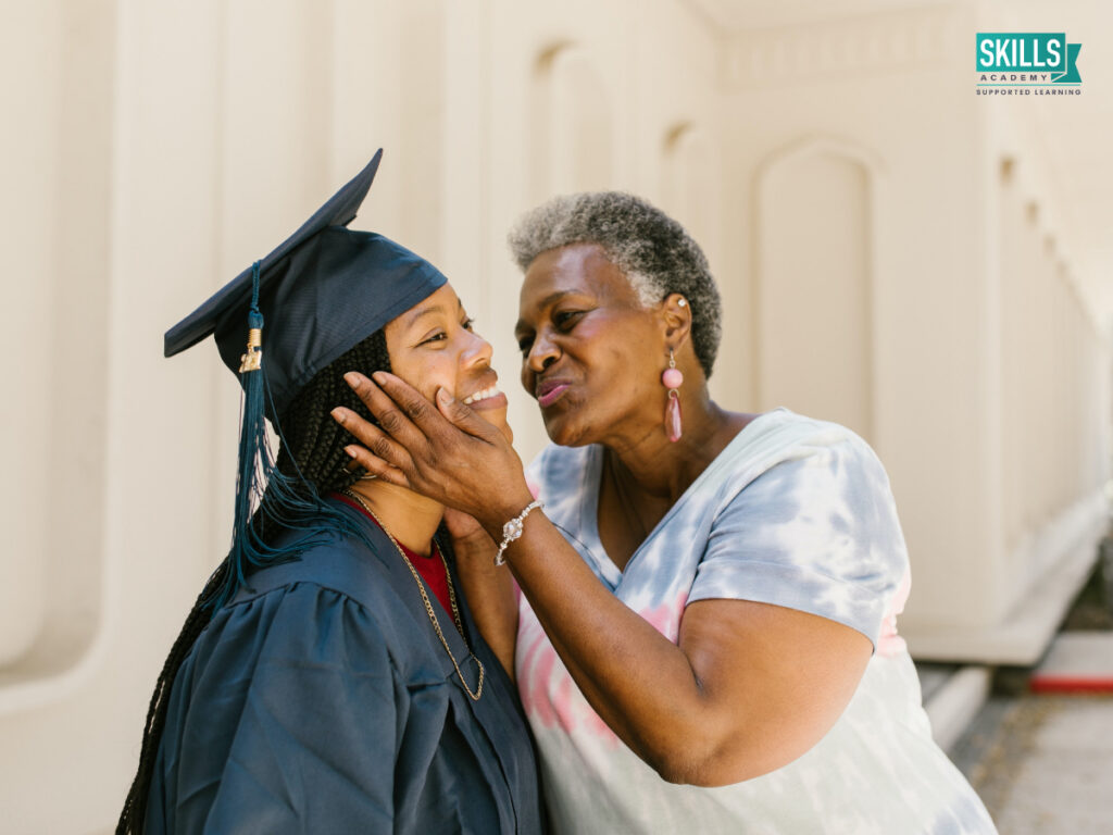 Parent loving squeezes her recentlyu graduated daughter's face. Find out when you will get your ICB certificate.