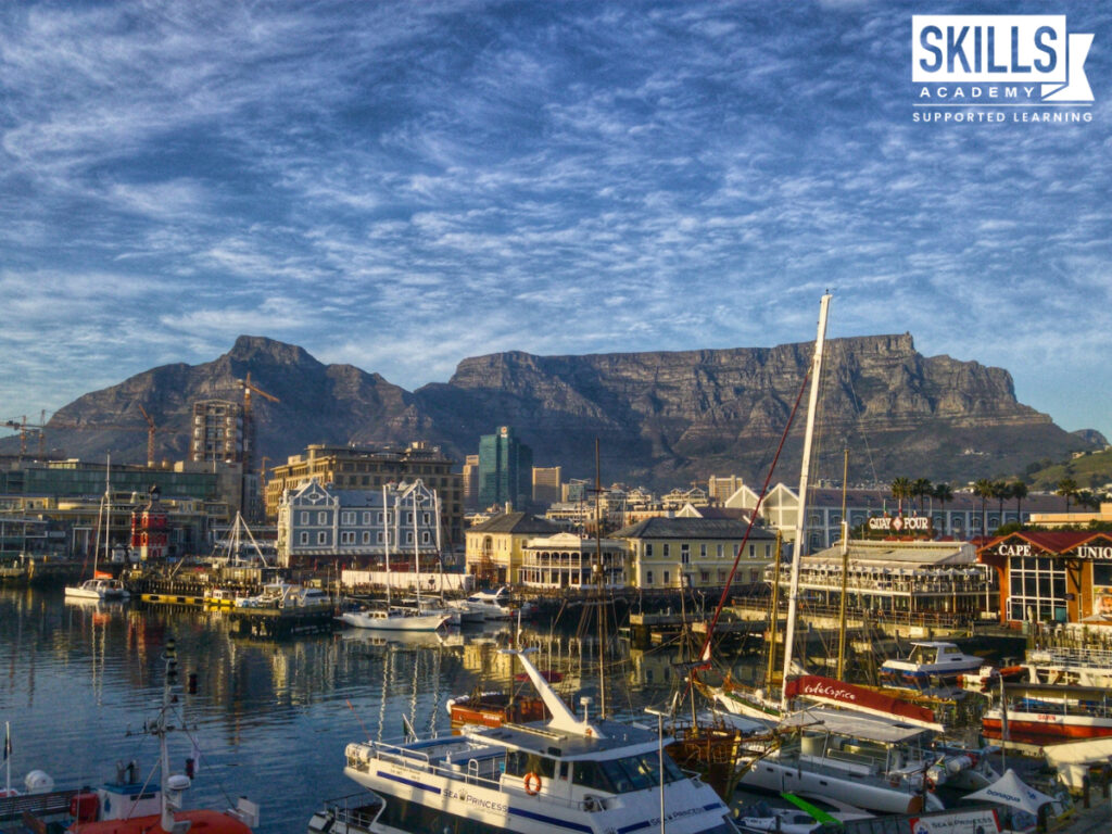 A view of Table Mountain and the harbour, where you can study Bookkeeping Courses in Cape Town. Study our distance learning courses today!