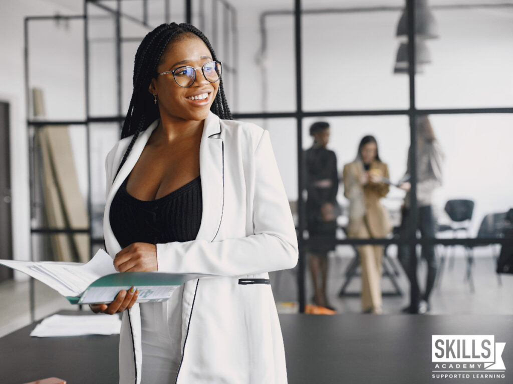 A businesswoman working at a company abroad. Take a look at our internationally recognised business management courses right here.