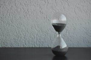 An hour glass. How Long Does It Take To Study ICB Courses?