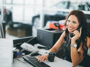 Woman making a call in an office.Study Office Administration Via Distance Learning